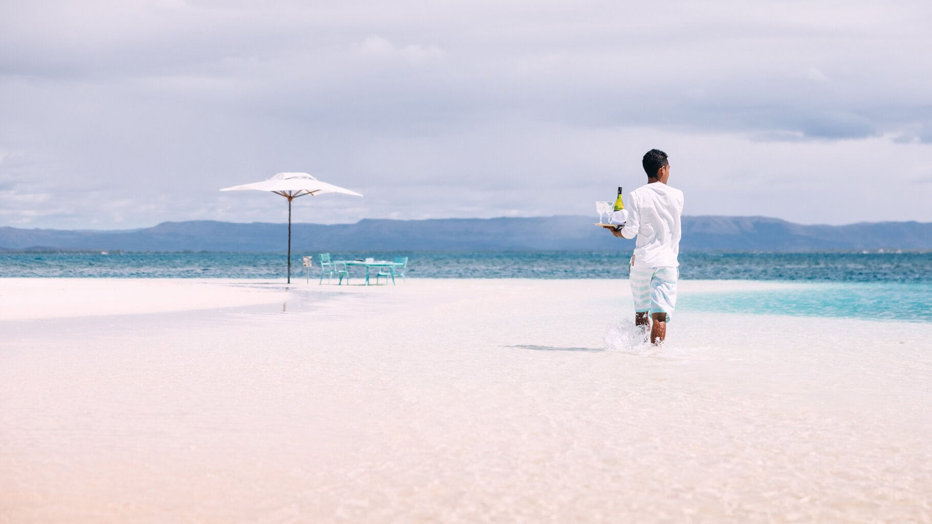 Lunch being served on a private beach at Miavana by Time + Tide