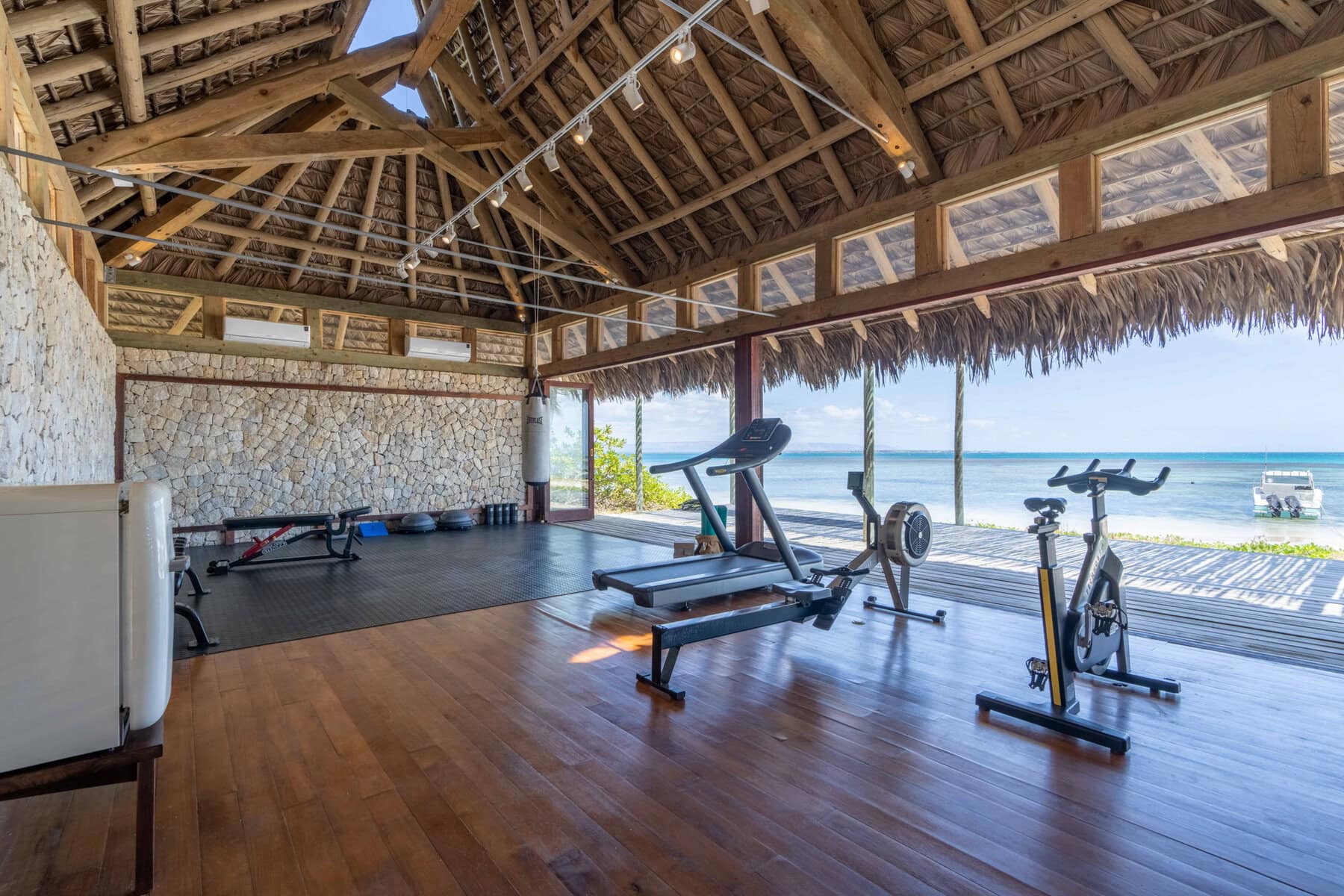 Gym and fitness centre looking out towards the ocean at Miavana by Time + Tide, Madagascar