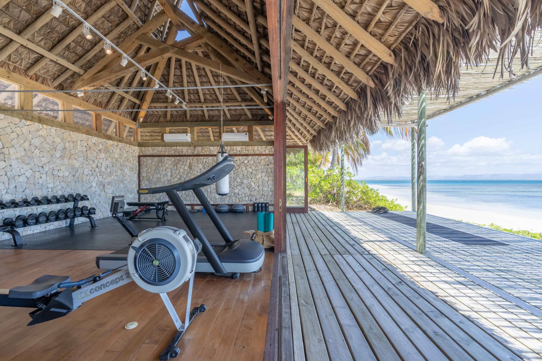 Gym and fitness centre looking out towards the ocean at Miavana by Time + Tide, Madagascar