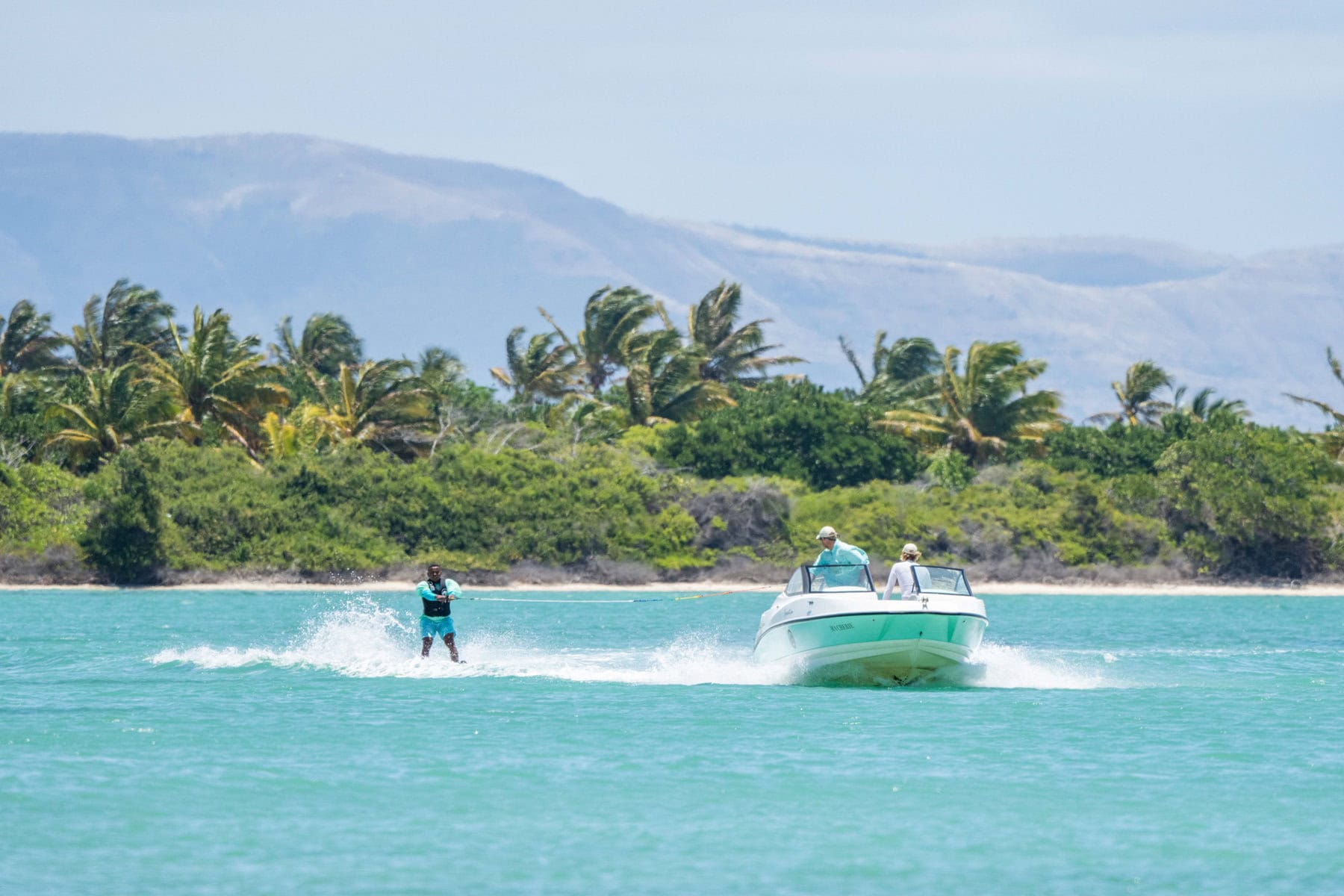 A guest water skiing at Miavana by Time + Tide Madagascar