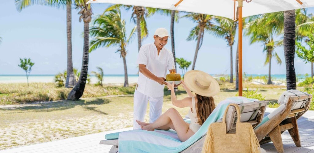 Opening a coconut at Miavana